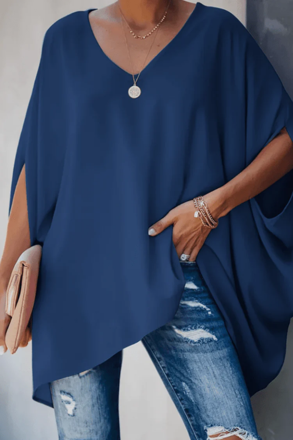 Lightweight women's pleated spring blouse, offering an effortless and elegant style for everyday comfort.