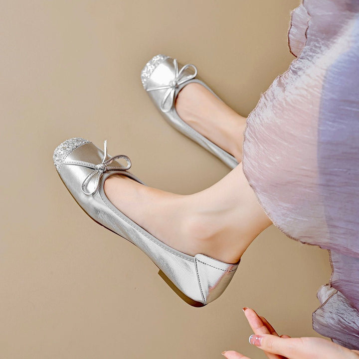 Stylish gold women's square toe ballet flats with a delicate bow, perfect for adding a touch of elegance.