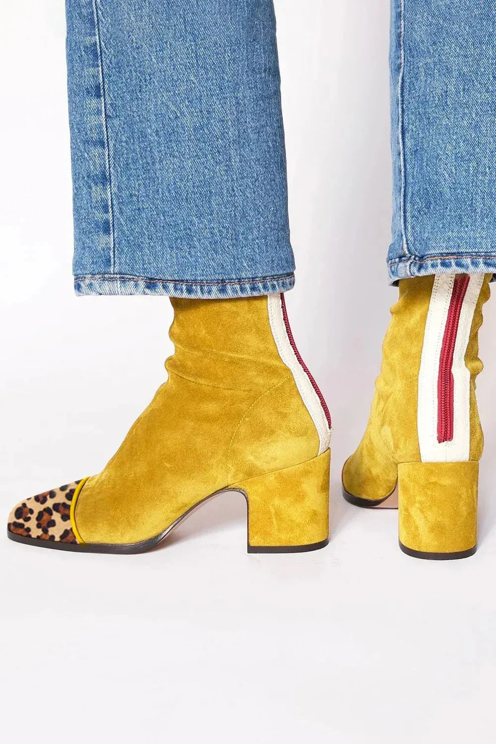 Sophisticated women's square toe ankle boots, a block heel design, offering versatile and stylish footwear.