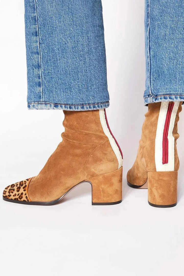 Black square toe heeled boots for women, featuring a block heel, ideal stylish footwear for fashion lovers.
