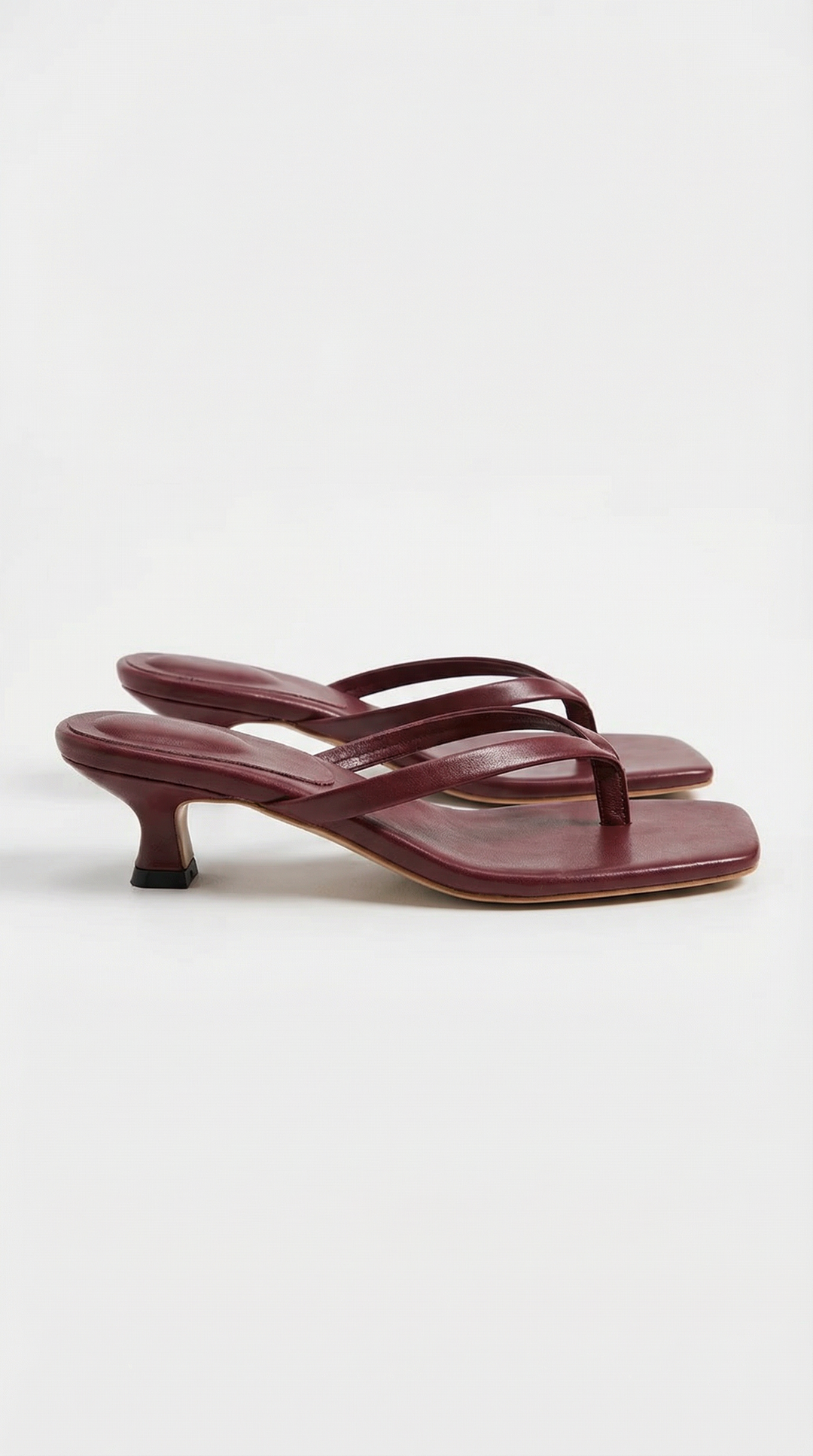 Modern minimalist women's square toe thong kitten heel sandals, perfect for any outfit.