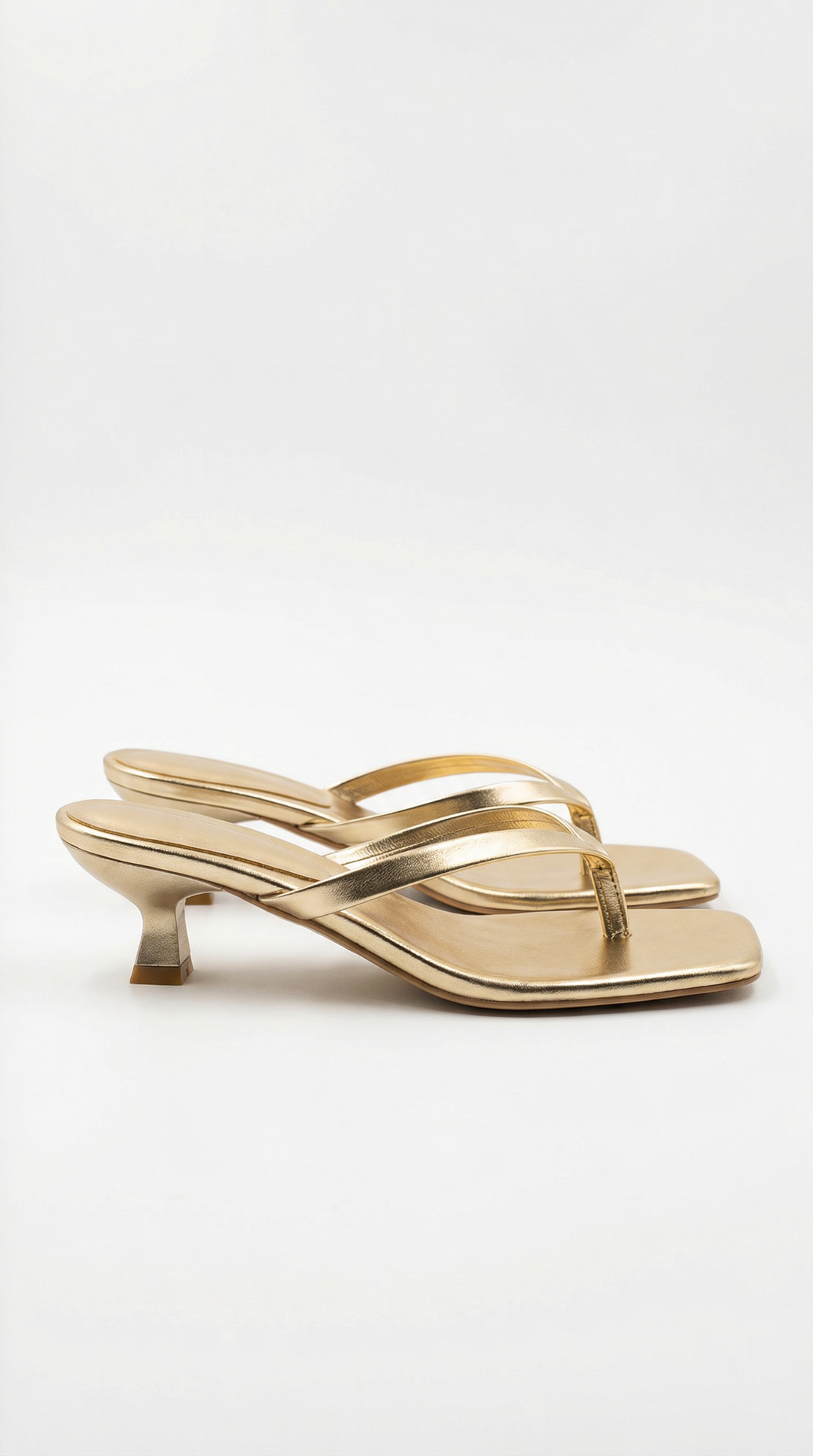 Versatile women's summer sandals: square toe, thong strap, low kitten heel.