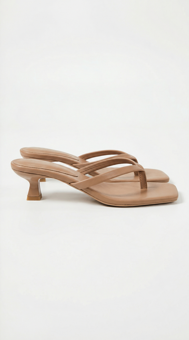 Contemporary women's square toe thong sandals with a comfortable kitten heel.