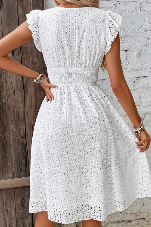 Textured jacquard strapless midi dress for women. A chic and elegant choice for any party or event.