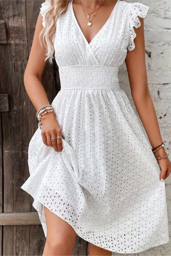 Stylish women's strapless midi dress with delicate jacquard weave. Elegant summer or occasion wear.