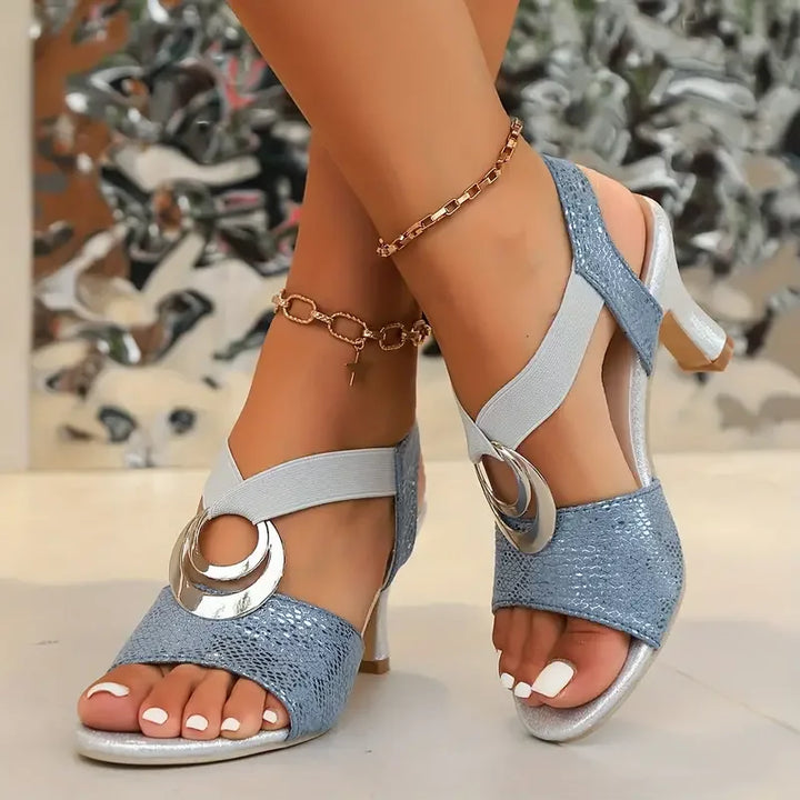 Stylish pair of women's strappy open toe block heels in classic color, suitable for any event.