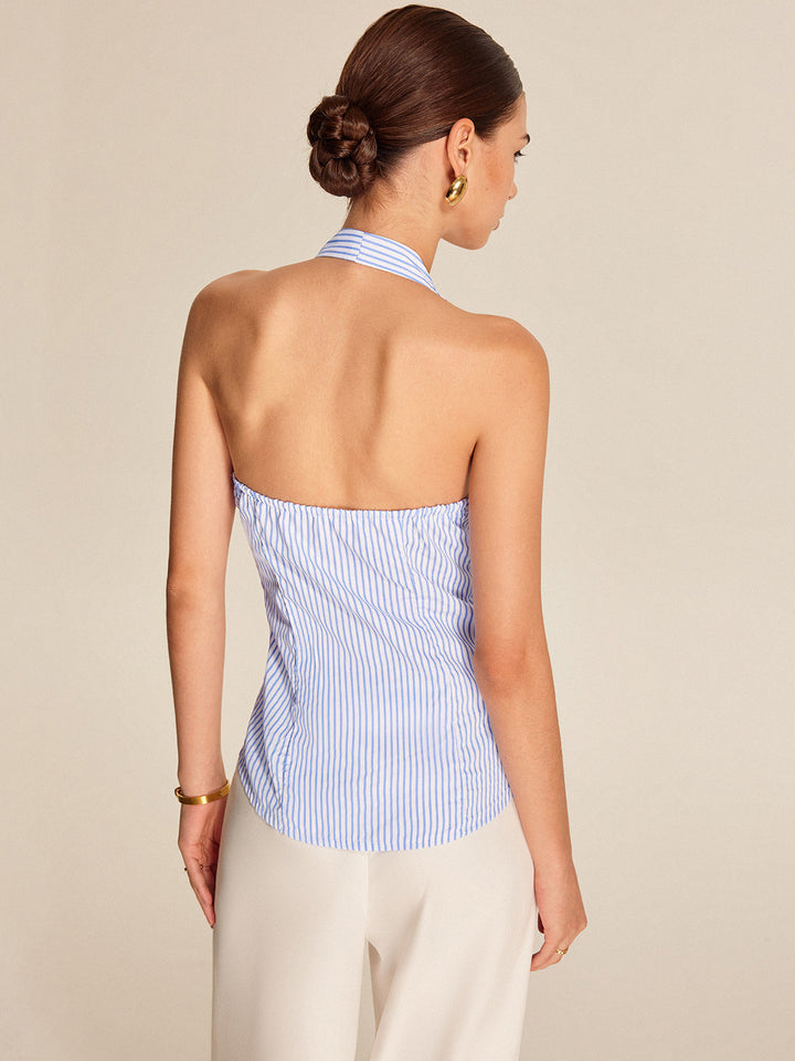 Women's striped halter top with a chic tie front. Sleeveless blouse for professional workwear or elegant casual chic outfits.