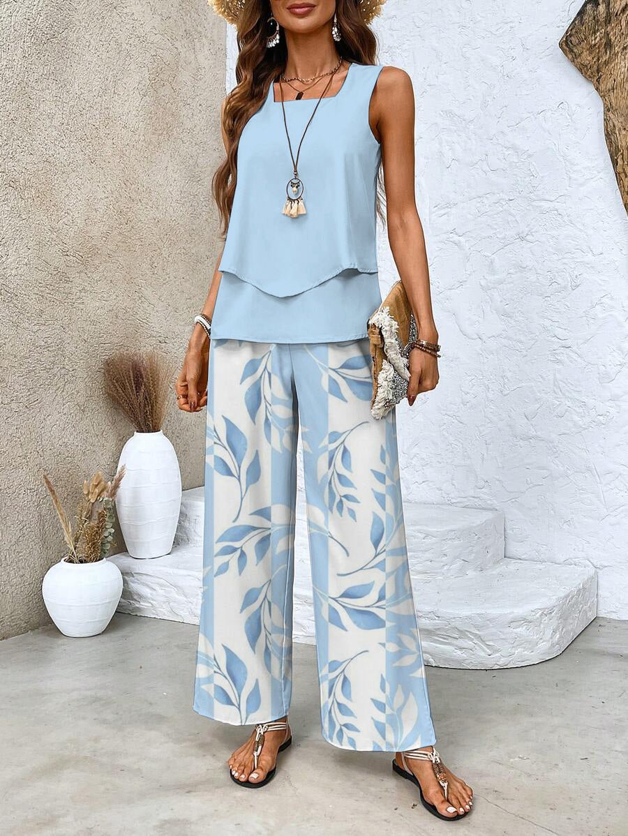 Chic women's summer set: flowy top & wide-leg pants. Perfect two-piece ensemble for ladies' casual elegance.