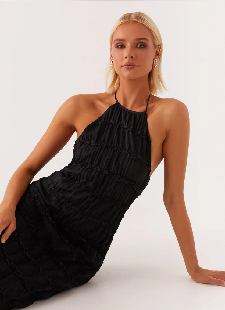 Chic textured halter maxi party dress for women, a stylish and comfortable wedding guest option.