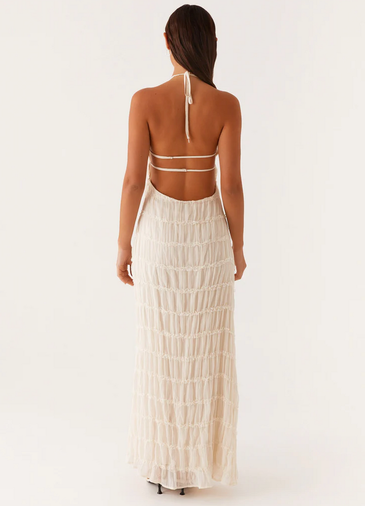 Sophisticated textured halter maxi dress, an elegant women's choice for any wedding guest occasion.
