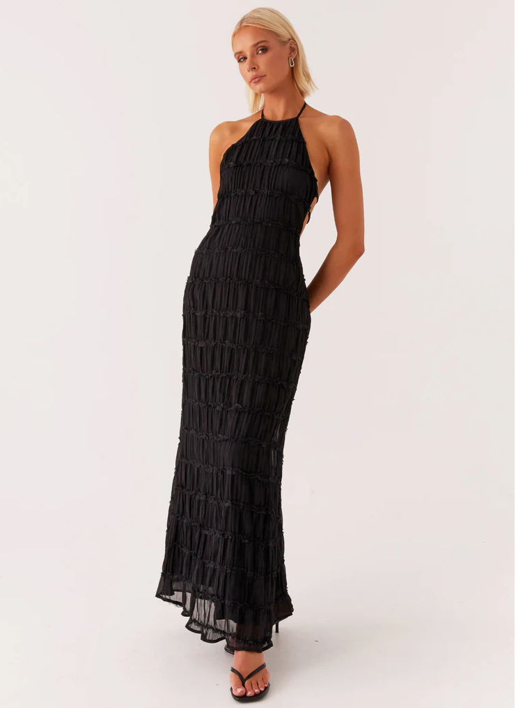 Women's elegant textured halter maxi dress, a chic choice for wedding guests & formal evening events.