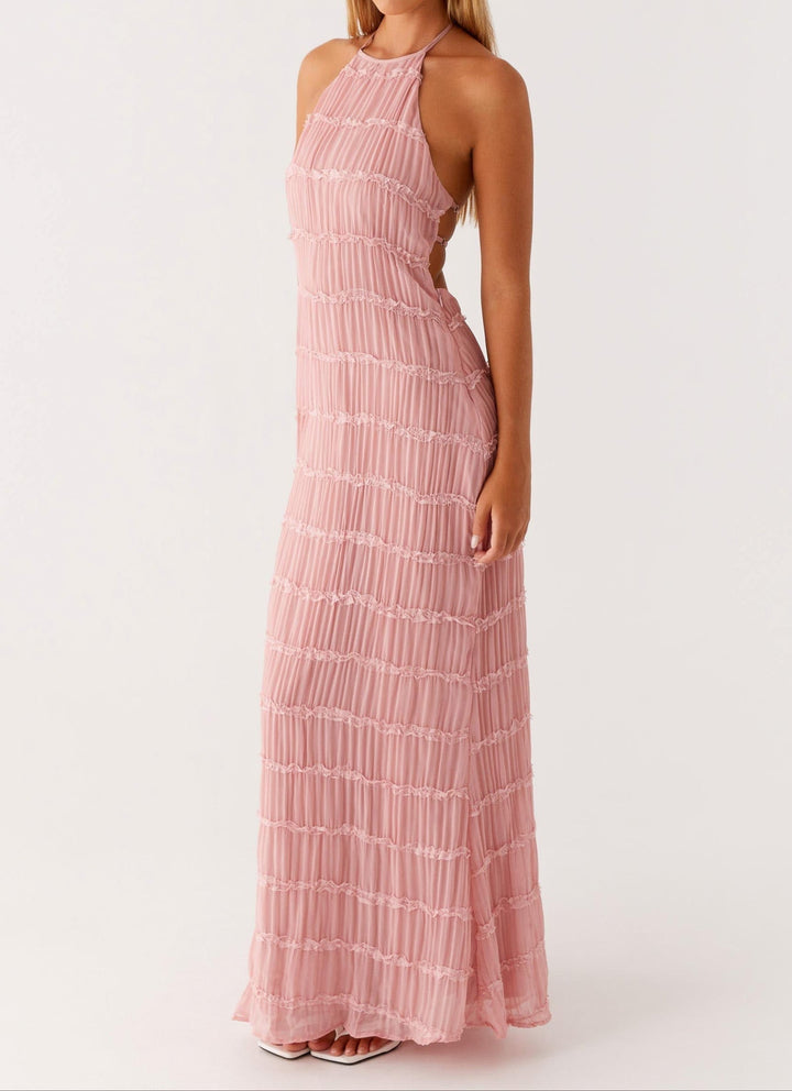 Stunning open-back halter maxi wedding guest dress with unique texture, perfect for special occasions.