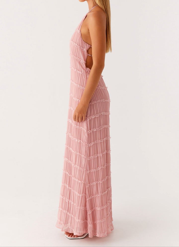 Elegant women's halter maxi dress, textured and chic for a sophisticated wedding guest look.