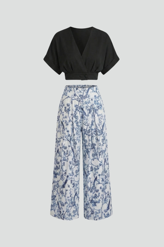 Chic women's V-neck two-piece set with elegant wide leg pants. Perfect coordinated outfit for versatile summer style.