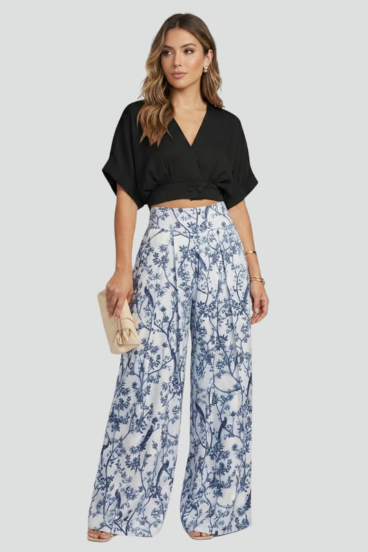 Coordinated women's V-neck top and patterned wide leg pants set. Effortless women's fashion for a chic everyday look.