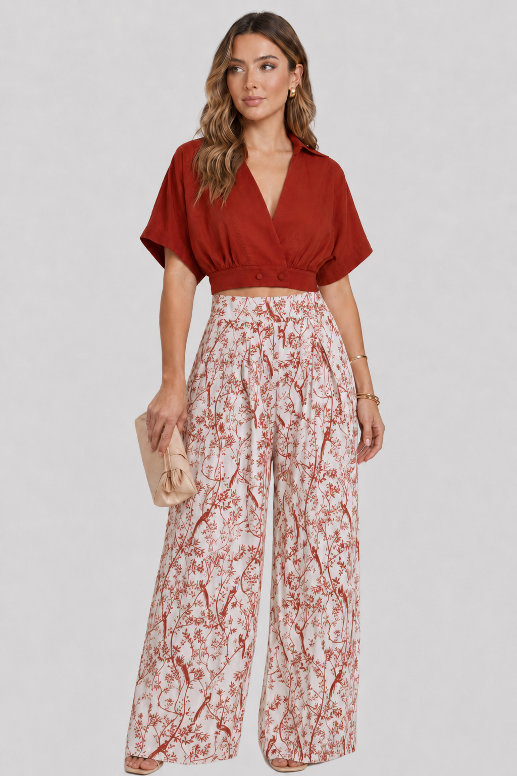 Modern women's V-neck top and wide leg pants set. A sophisticated two-piece outfit for elegant and comfortable style.
