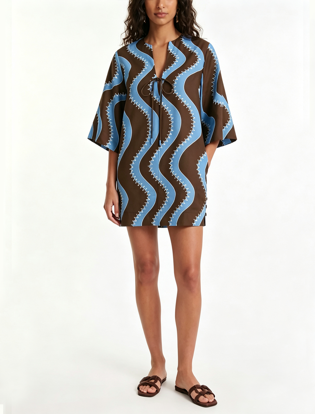 Chic women's wave print mini dress with button front, elbow sleeves, perfect for summer casual or beachwear.