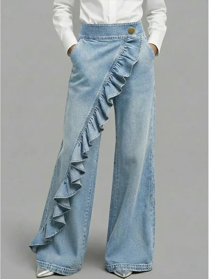 Fashionable women's wide leg jeans, high-rise with elegant ruffle detail, creating a chic statement.