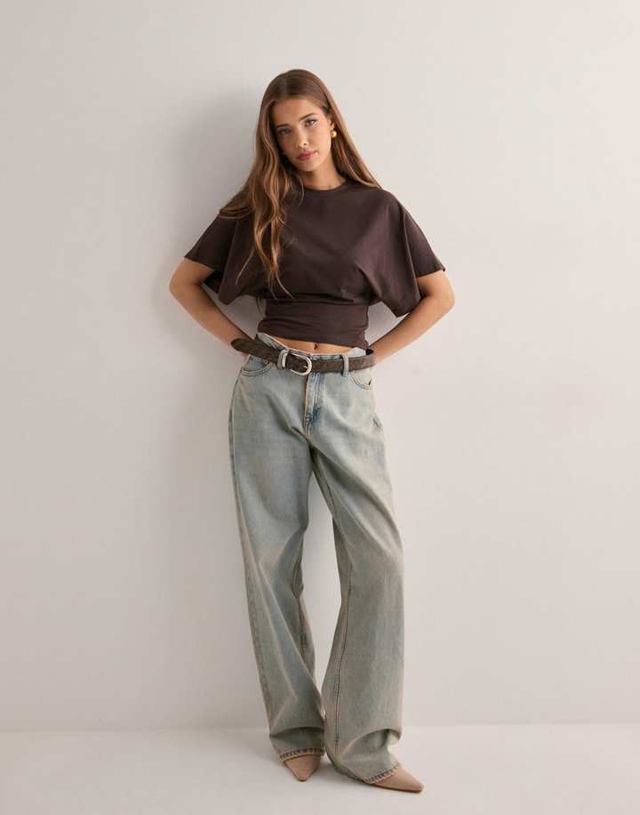 Comfortable women's wide sleeve t-shirt, a chic and modern fashion top for versatile everyday apparel.