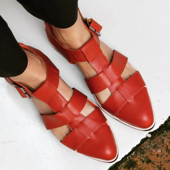Chic women's woven flat sandals with buckle closure, perfect for comfortable casual daily wear and versatile summer style.