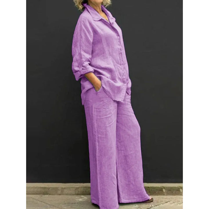 Versatile women's two-piece set featuring a tailored button-up shirt & trendy wide-leg pants. Casual chic.