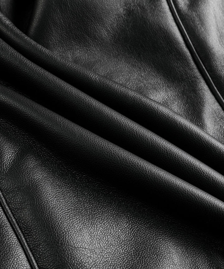 Classic unisex aviator coat in black with plush faux shearling, an iconic piece of winter outerwear.