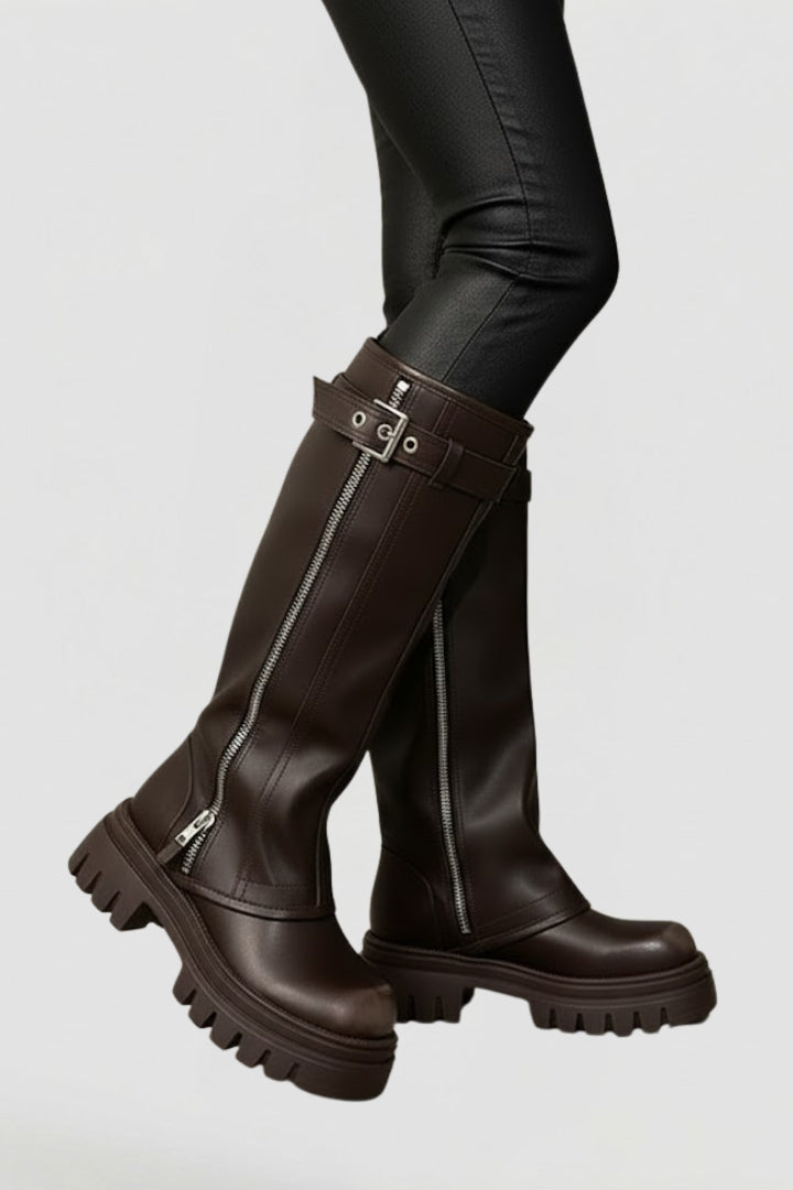 Versatile women's knee-high platform boots in classic black, designed with a round toe and practical side zip.