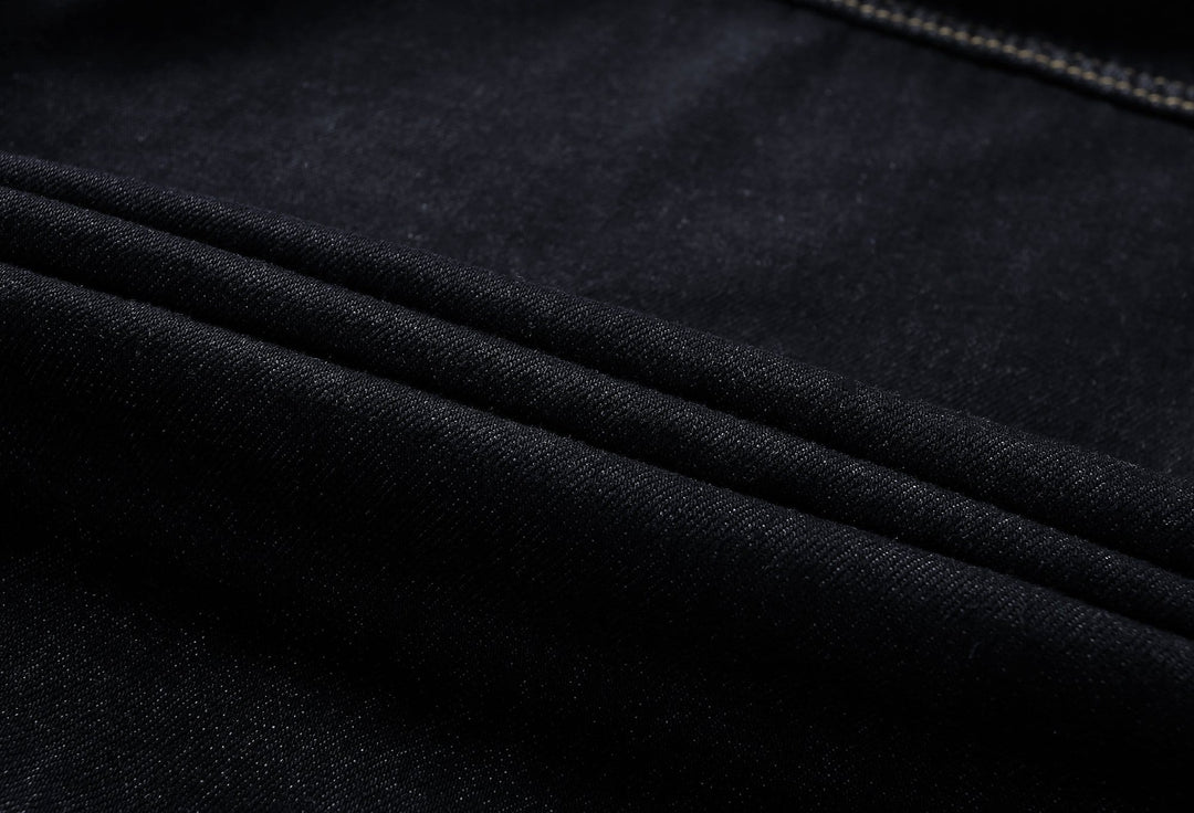 Model wearing a classic denim jacket, demonstrating its comfortable fit and casual style.