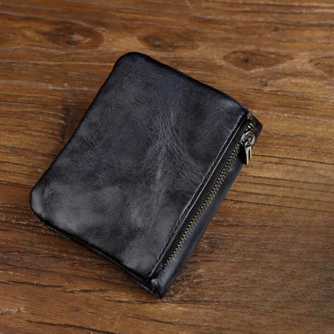 Elegant full-grain leather mens wallet in black, showcasing premium craftsmanship.