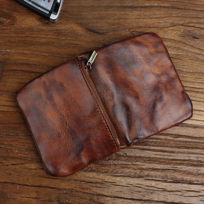 Open classic full-grain leather wallet for men, brown, revealing card slots and bill compartment.