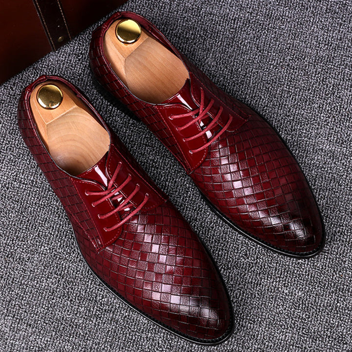 Classic leather men's lace-up dress shoes, versatile for formal, business, or smart casual occasions.