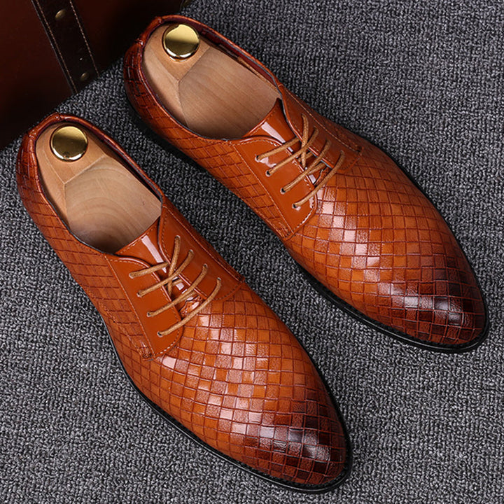 Stylish men's leather lace-up shoes with a classic design, ideal for versatile everyday wear & events.