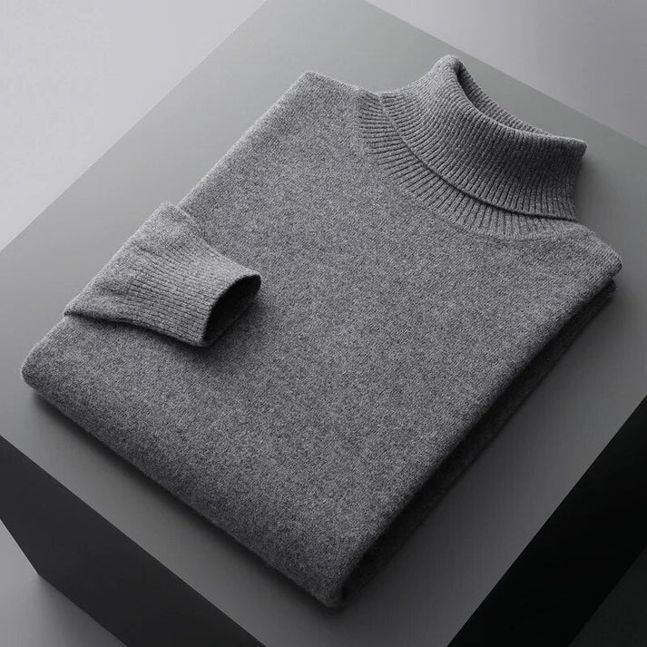 Stylish men's turtleneck sweater for a sleek, modern look. Essential winter wear & business casual.
