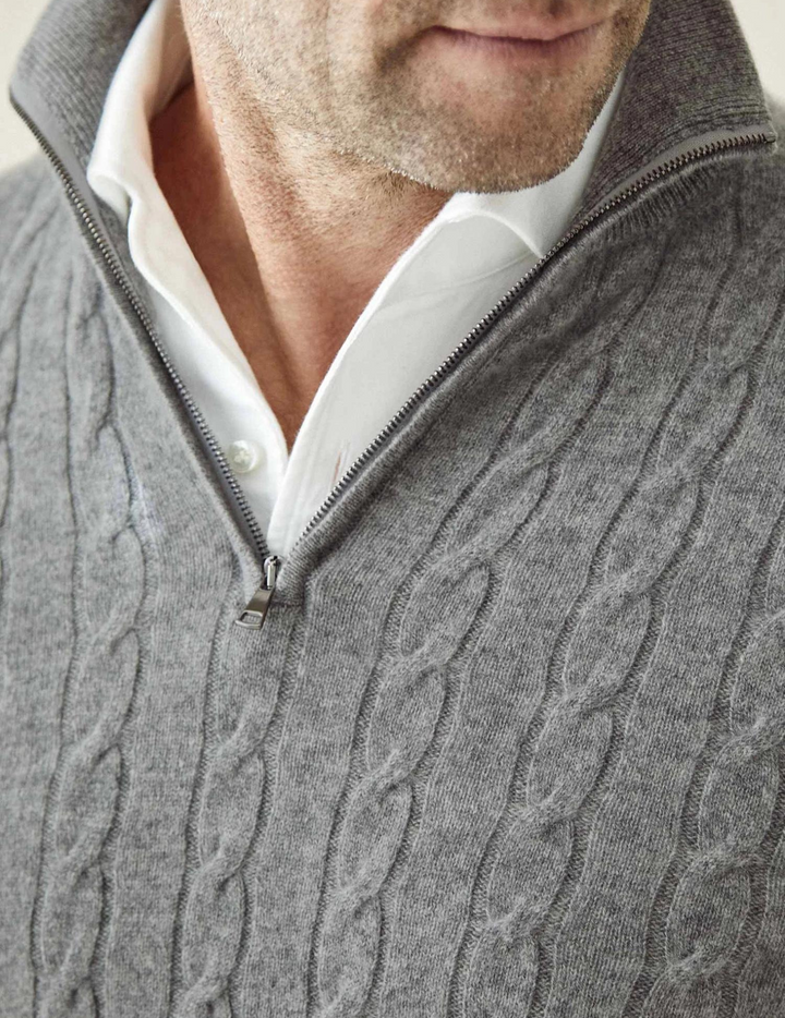 Men's long-sleeve cable knit quarter-zip sweater, great for cool autumn days and layering.