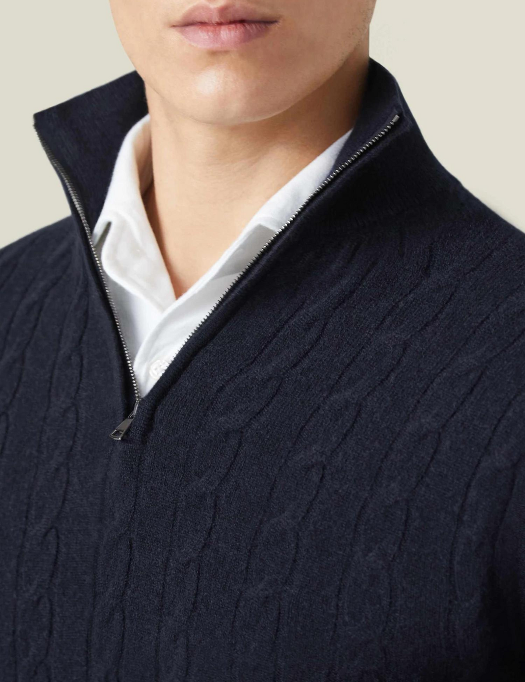 Premium men's cable knit quarter-zip sweater, a timeless addition to any wardrobe.