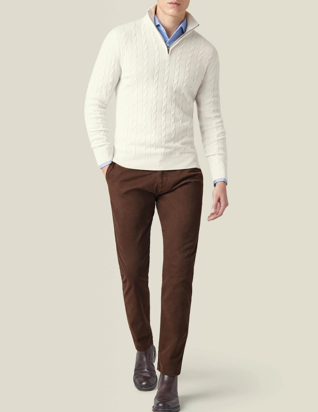 Cozy men's pullover sweater: a cable knit quarter-zip for cold weather comfort and warmth.