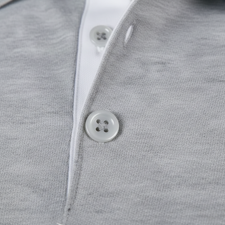 Solid color adult men's polo for everyday comfort and versatile styling.