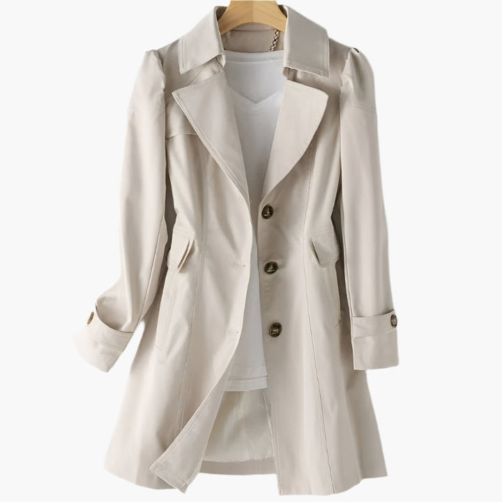Stylish women's long trench coat, offering a tailored fit and classic outerwear elegance. Versatile fashion.