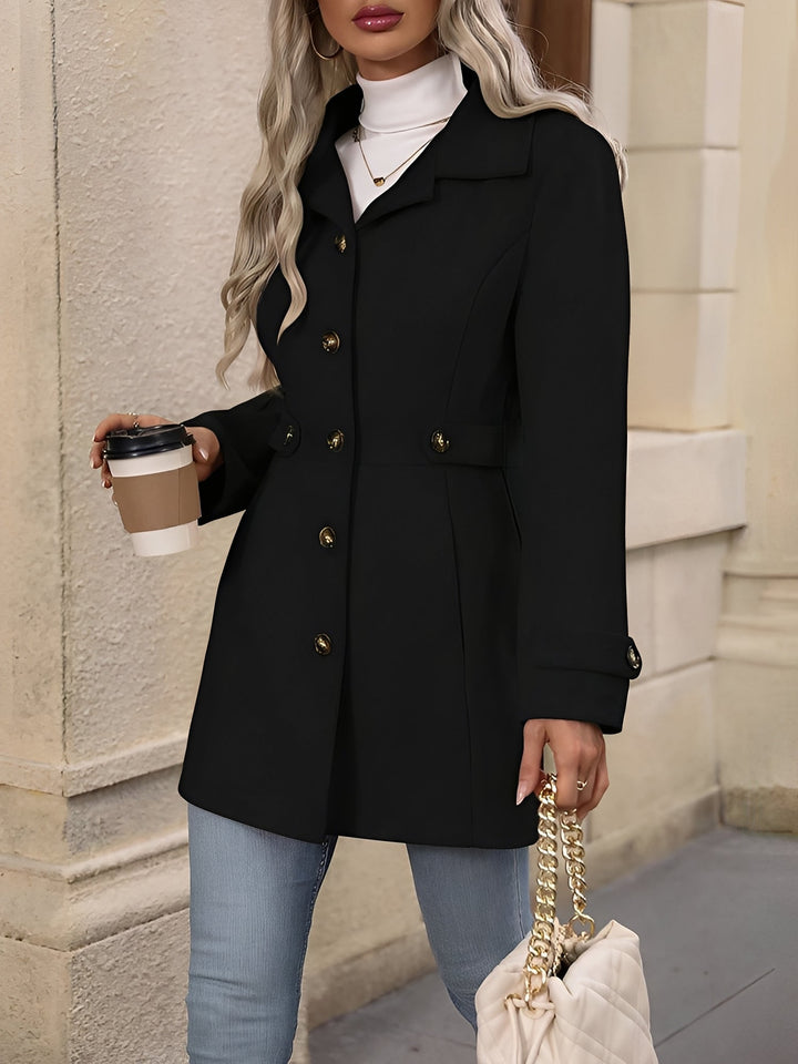 Elegant women's long trench coat, double-breasted closure, and a fashionable belted waist for all seasons.