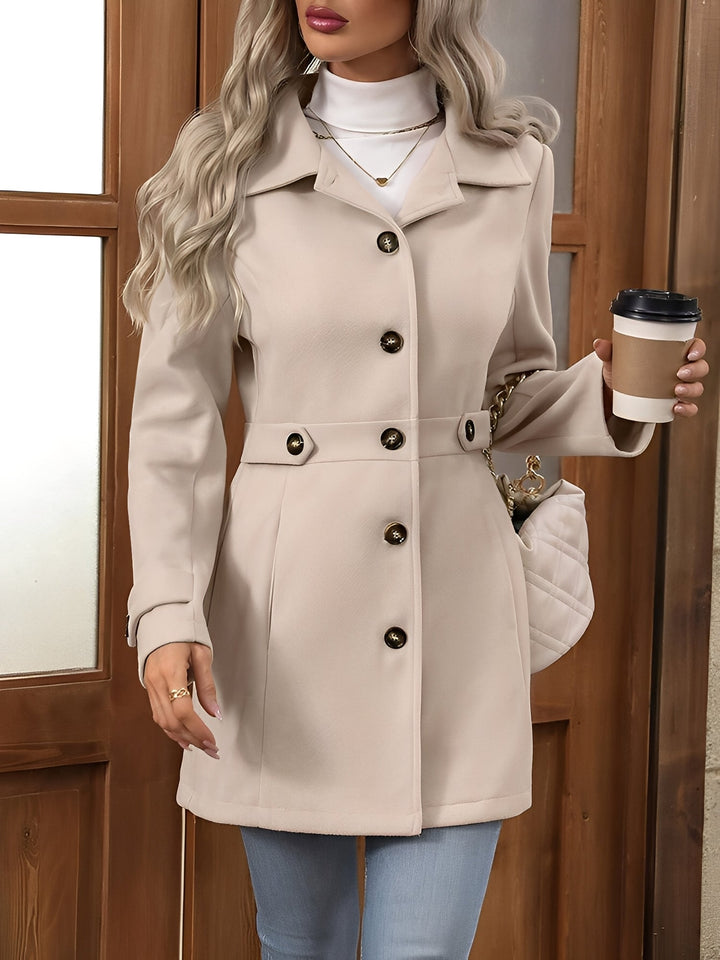 Sophisticated women's trench coat, double-breasted closure and adjustable belt, perfect for office & casual.