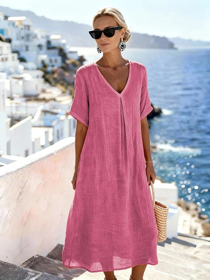 Close-up of the V-neckline and short sleeves detail on a Women's Relaxed Midi Dress.