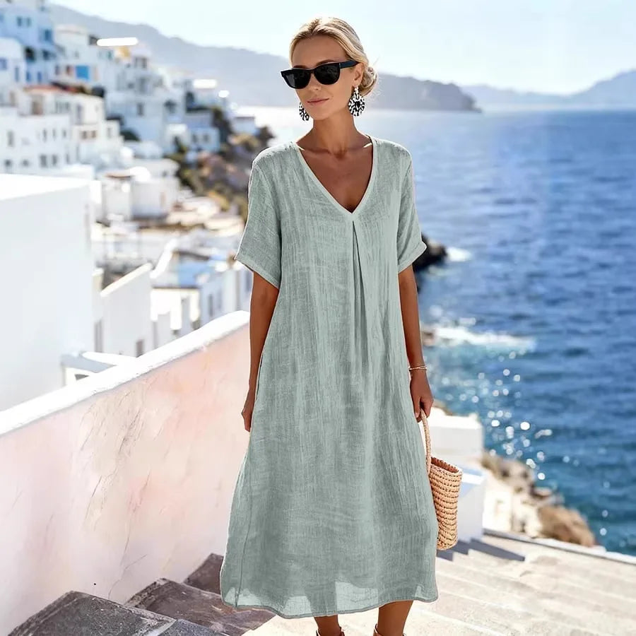 Relaxed fit V-Neck Midi Dress for women, featuring a flattering silhouette and flowy design.