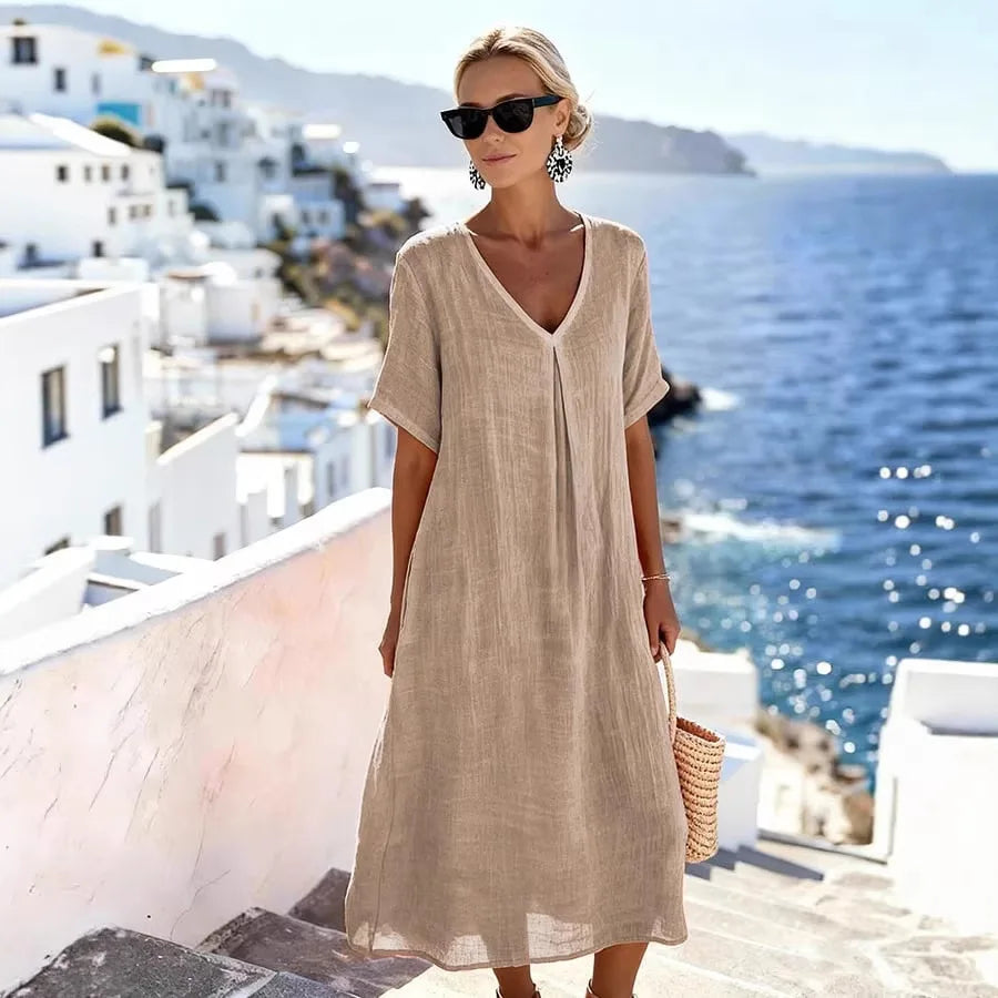 Everyday Women's Midi Dress with V-neck and short sleeves, suitable for travel and casual wear.