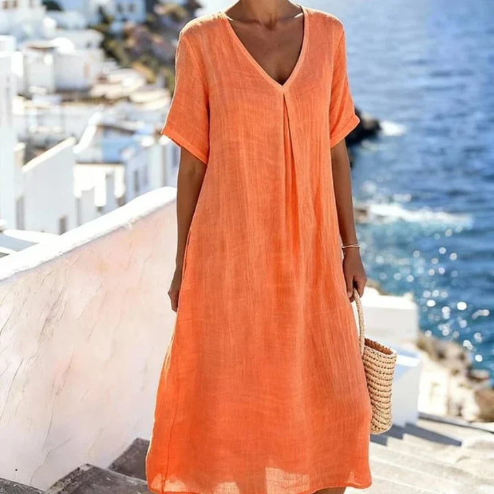 Comfortable short sleeve V-Neck Midi Dress for women, designed for a relaxed and airy feel.