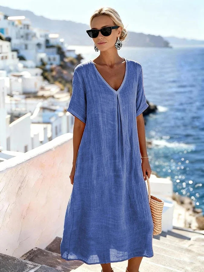 Women's casual midi dress with a V-neckline & short sleeves, great for warm weather.
