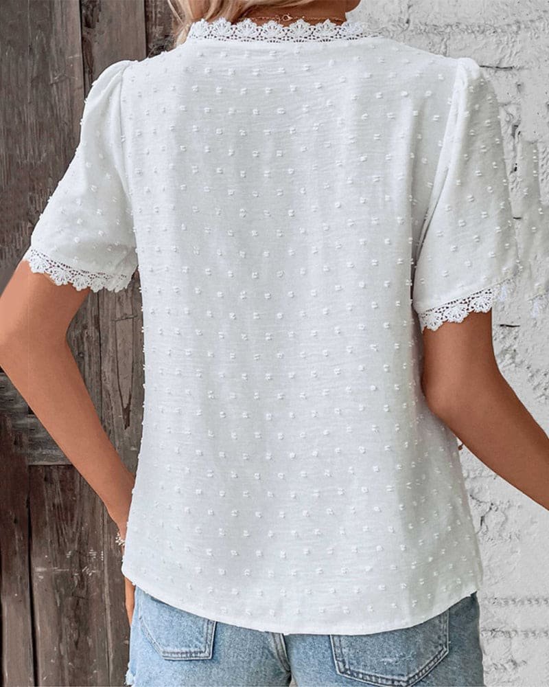 Stylish Women's Swiss Dot V Neck Top featuring elegant lace trim, a must-have for spring casual & boho outfits.