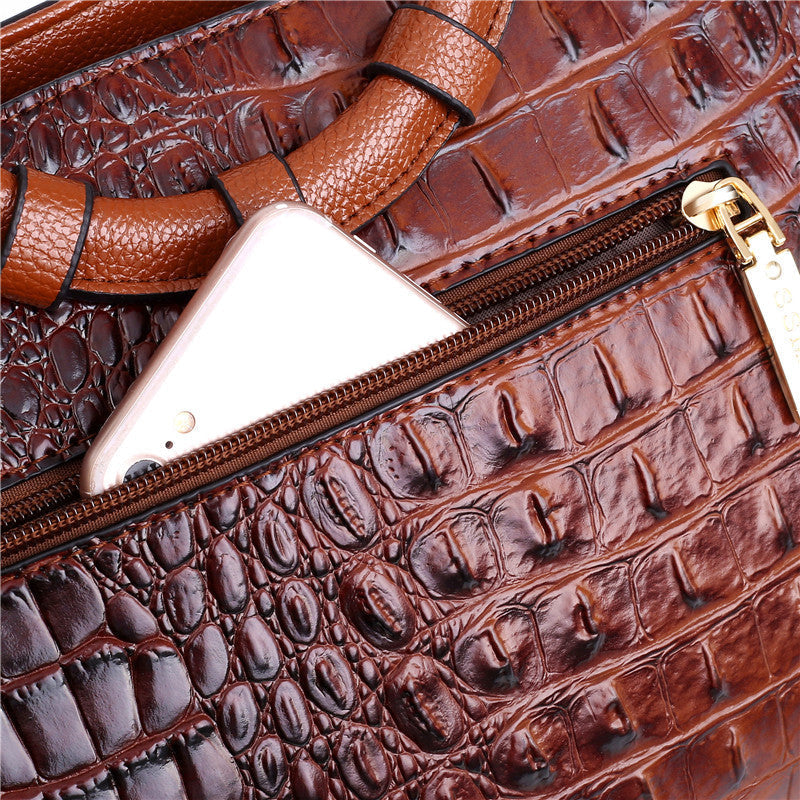 Elegant black croc embossed faux leather women's handbag, vintage charm, versatile style.