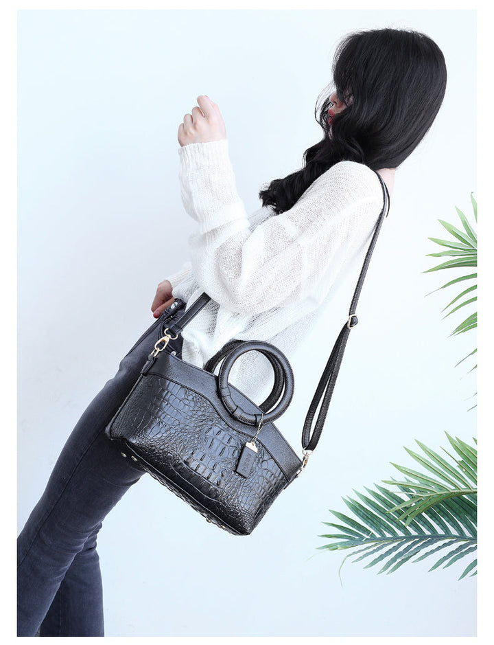 Vintage style women's handbag, croc embossed faux leather, a timeless and versatile accessory.