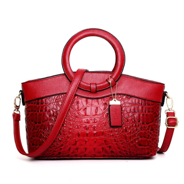 Red croc embossed faux leather women's shoulder bag, vintage elegance, versatile accessory.