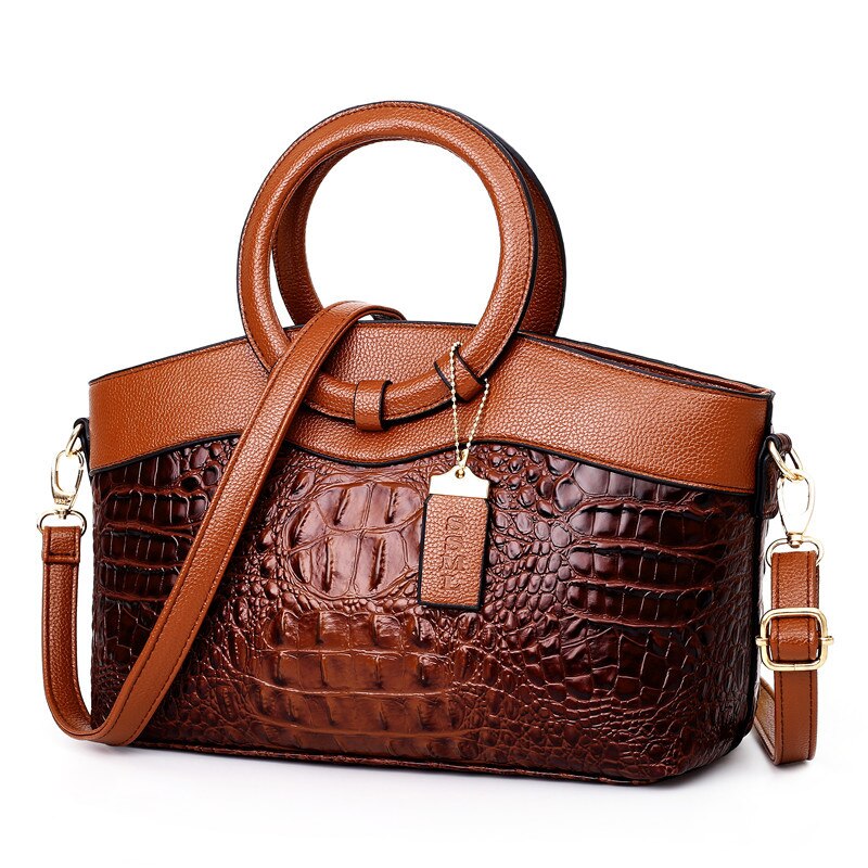 Women's versatile shoulder bag in classic black croc embossed faux leather, vintage style.